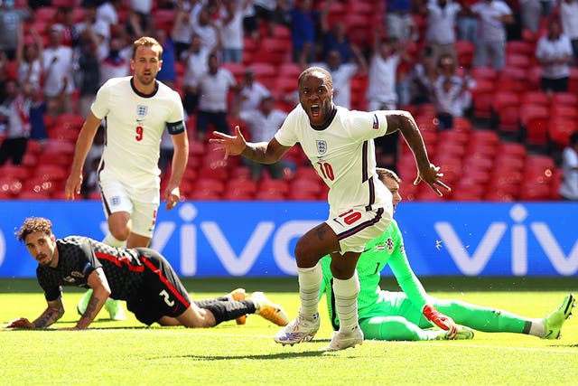 <p>Raheem Sterling scores the opening goal of the Euros for England at Wembley on Sunday afternoon</p>