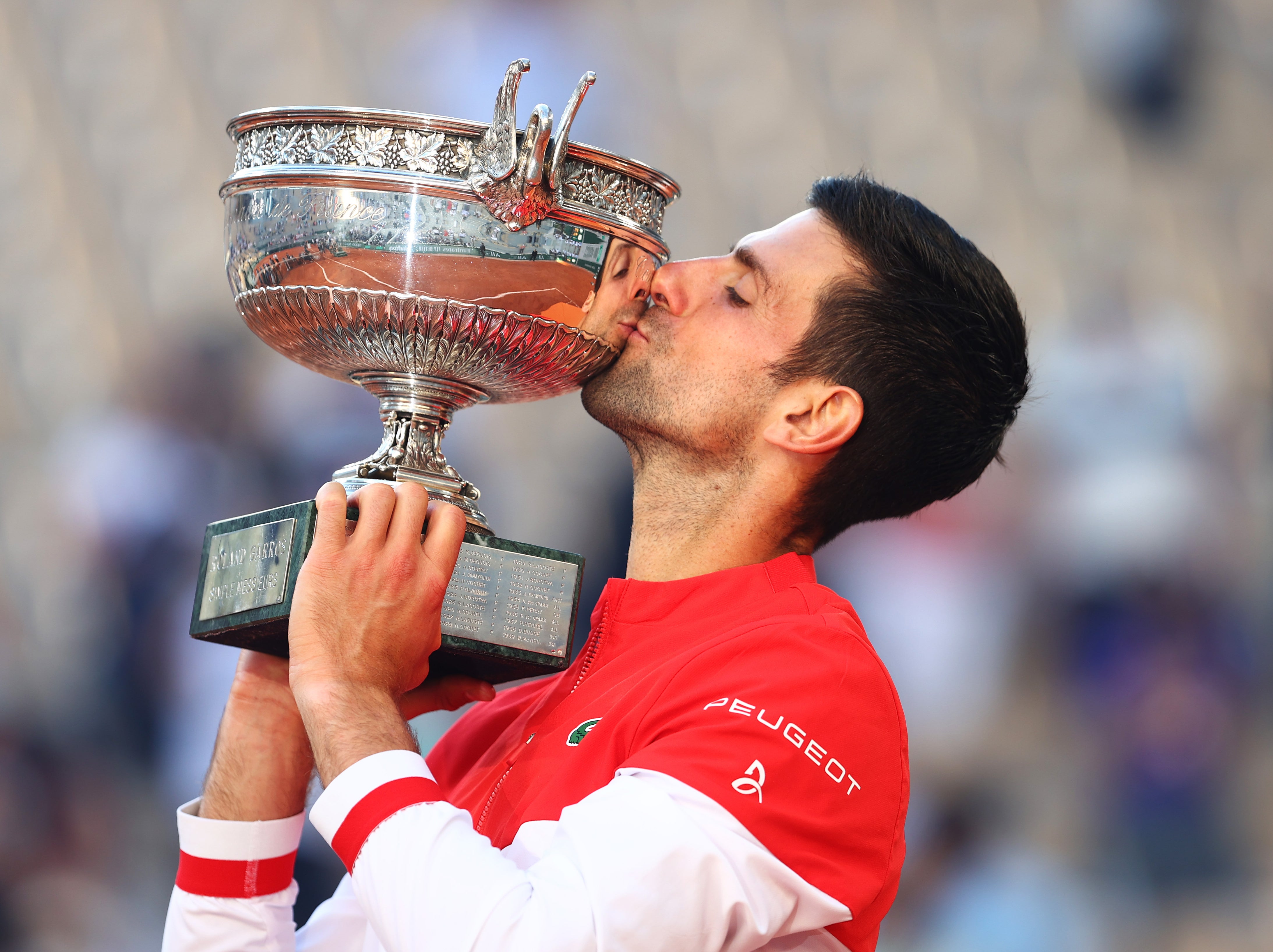 Novak Djokovic with his 19th Grand Slam trophy