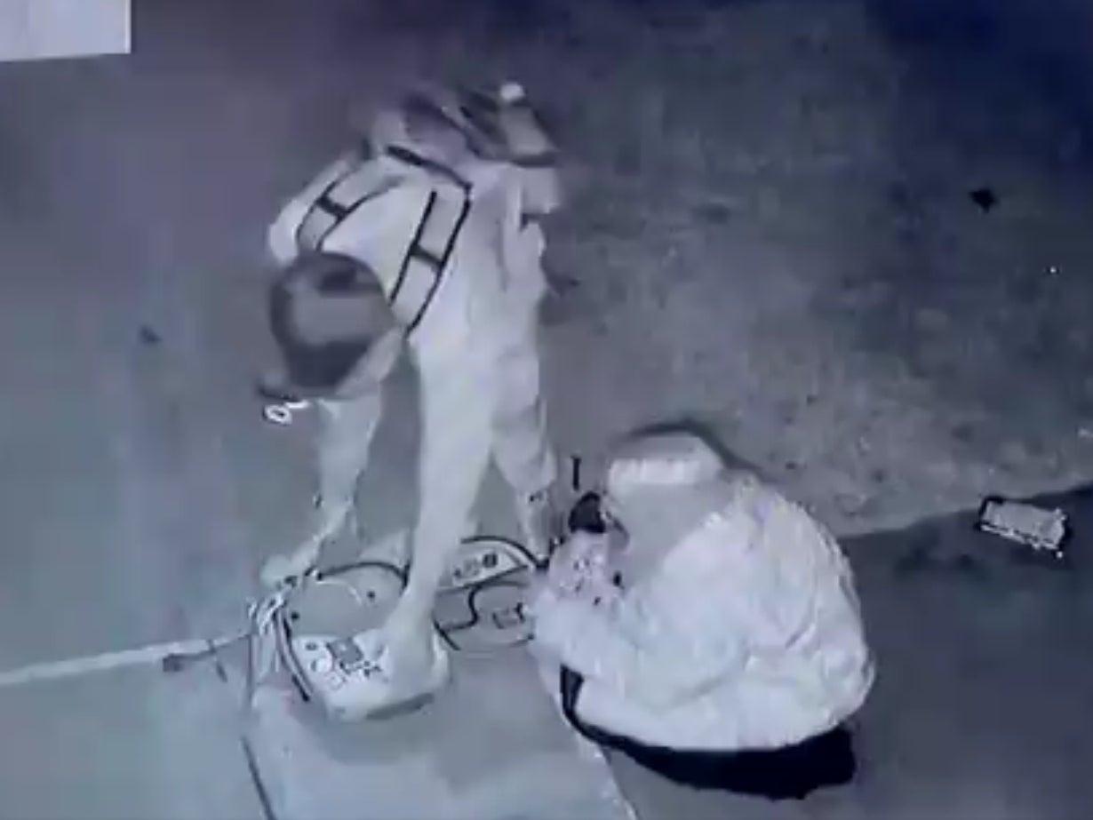 <p>CCTV footage appears to show a young man and woman vandalising the equipment</p>