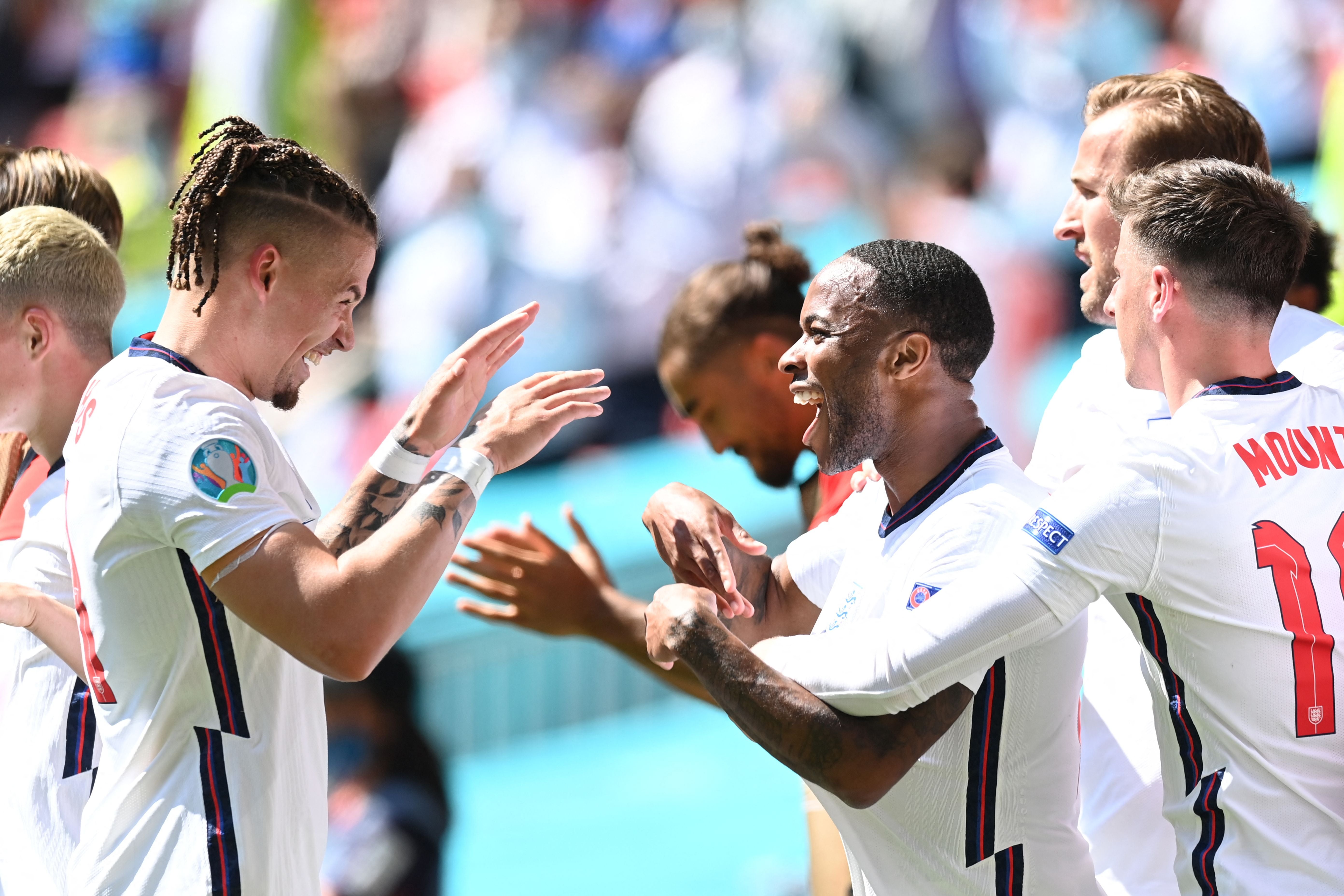 Raheem Sterling celebrates with Kalvin Phillips during England’s first Euro 2020 match