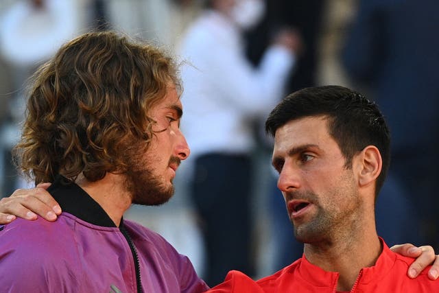 <p>Novak Djokovic (right) consoles Stefanos Tsitsipas after the French Open final</p>