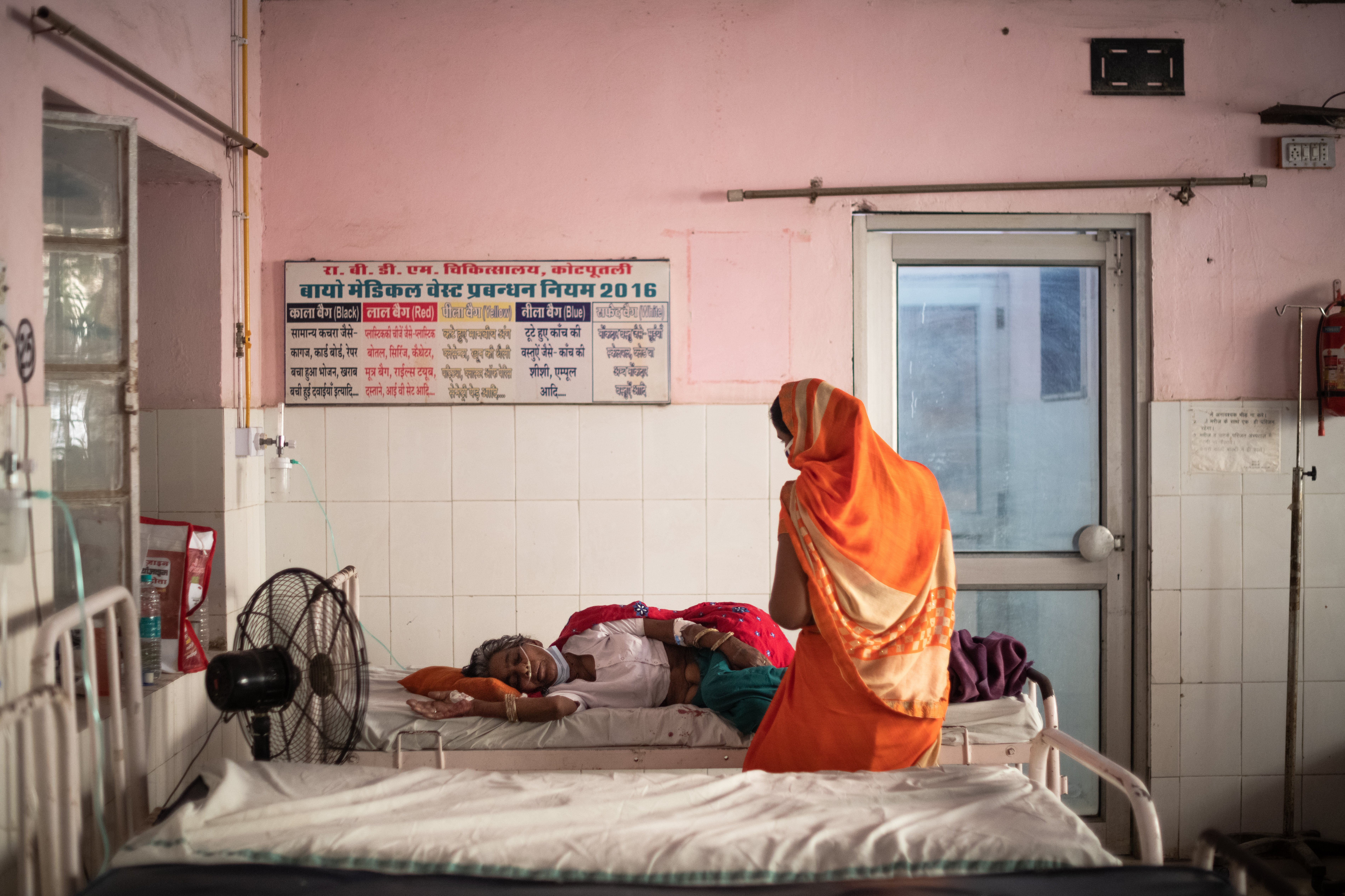 A Covid patient is treated with oxygen at a hospital in Rajasthan, India