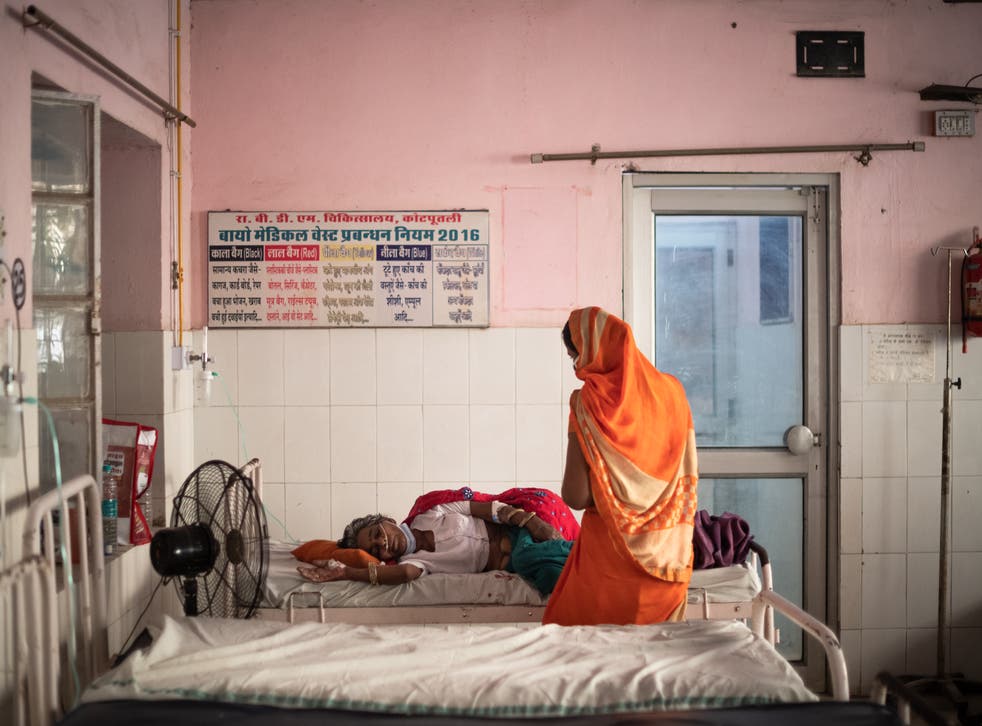 <p>A Covid patient is treated with oxygen at a hospital in Rajasthan, India</p>