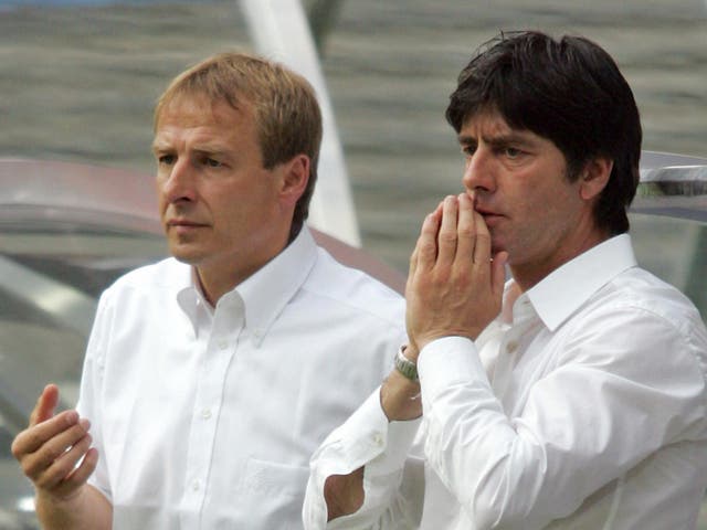<p>Jürgen Klinsmann (left) with Joachim L?w in the Germany dugout in 2005</p>