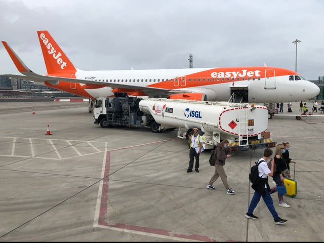 <p>Rare sight: an easyJet Airbus at Gibraltar airport, one of the very few locations from which quarantine is not required</p>