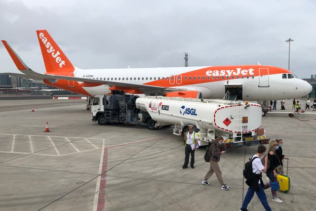 <p>Rare sight: an easyJet Airbus at Gibraltar airport, one of the very few locations from which quarantine is not required</p>