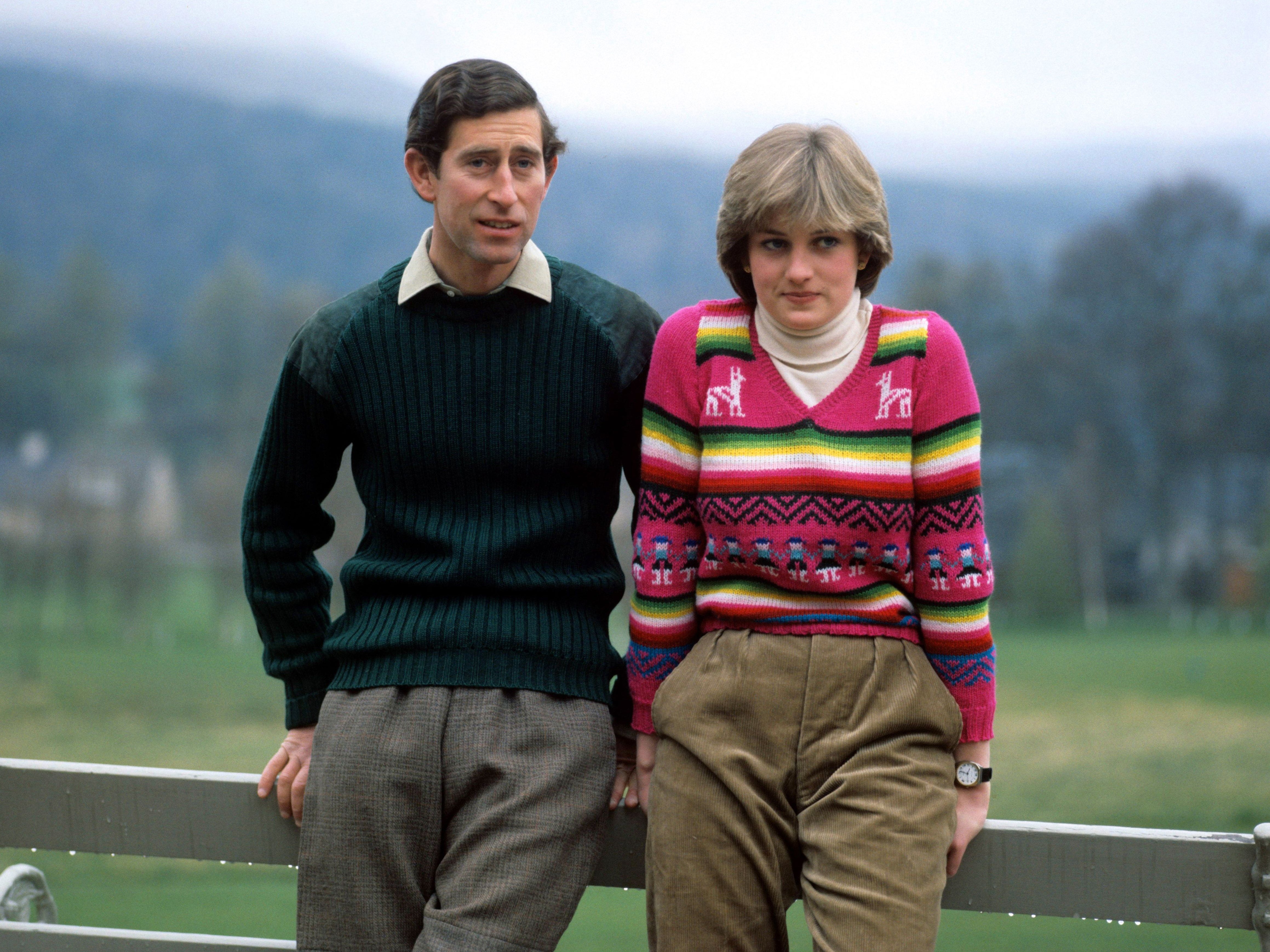 Prince Charles pictured at Balmoral in Scotland alongside Princess Diana in May 1981. The Princess wore one of her memorable knits for the occasion: a v-neck alpaca wool number with pink, green and purple stripes. Diana wore the jumper with a loose-fitting pair of beige trousers.