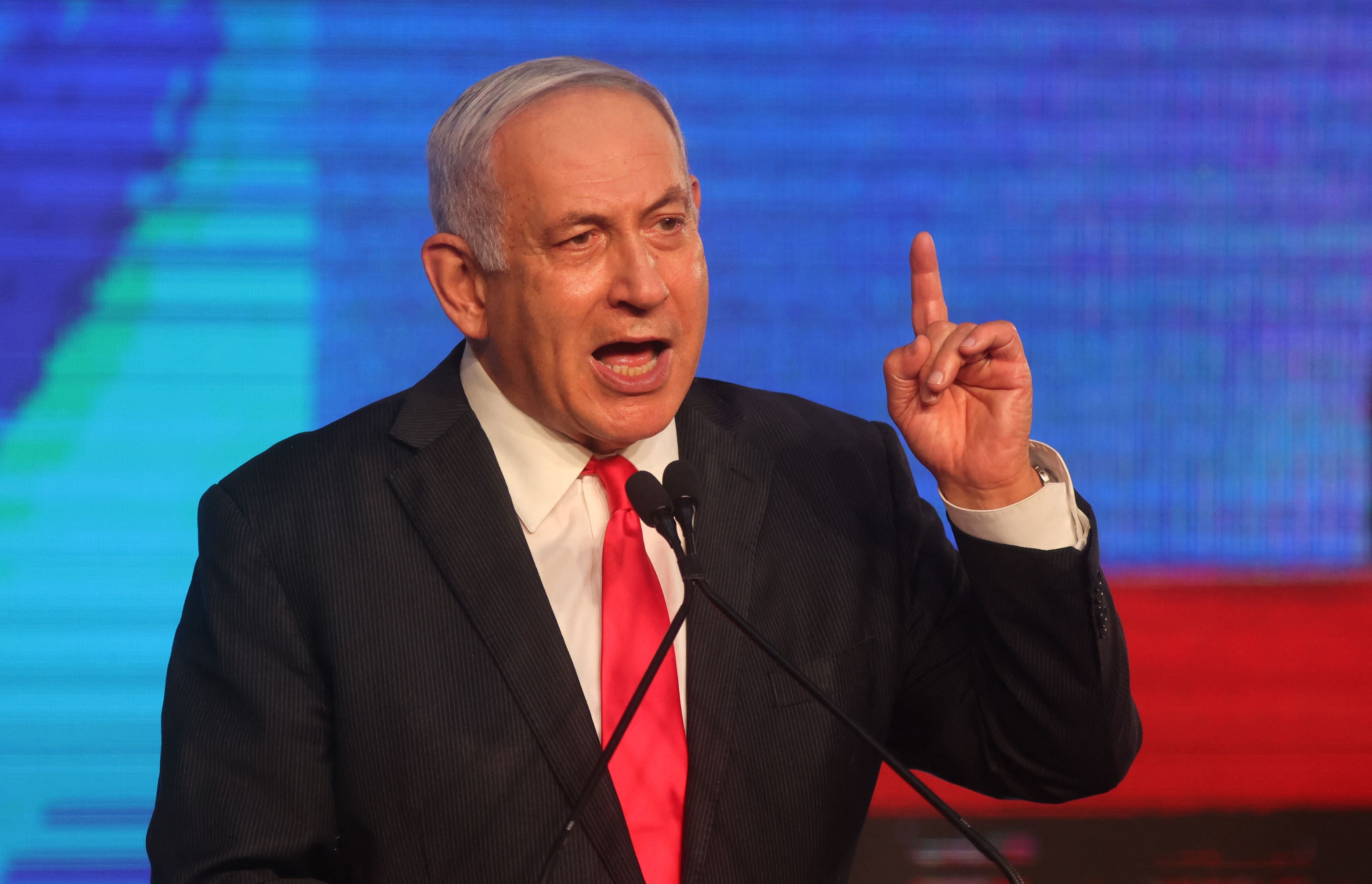 Netanyahu addresses supporters at the party campaign in Jerusalem earlier this year