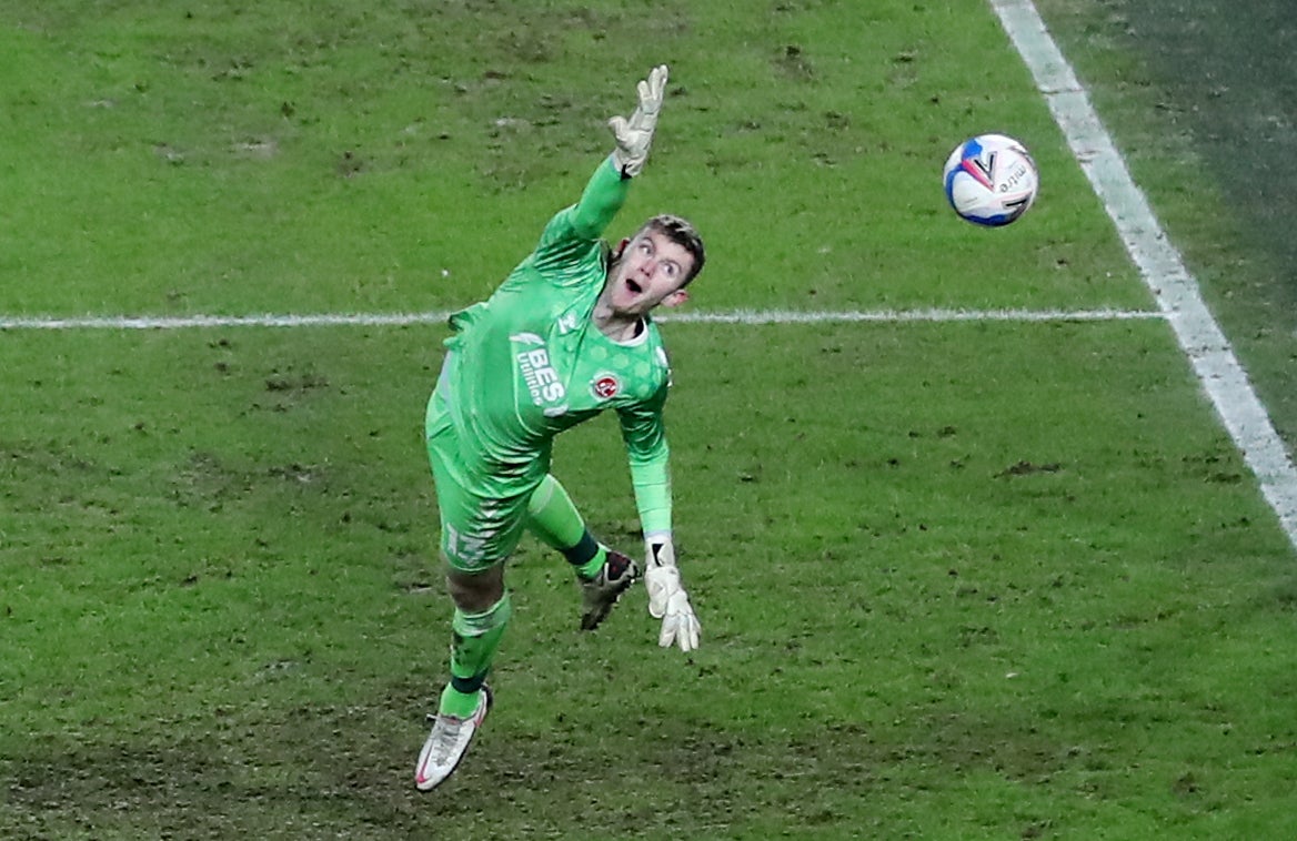 Joe Hilton is beaten by Hull's Lewie Coyle, not pictured, while on loan at Fleetwood