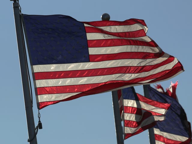 <p>US flags fly on the ground of the Washington Monument on Flag Day 14 June 2019 in Washington, DC</p>