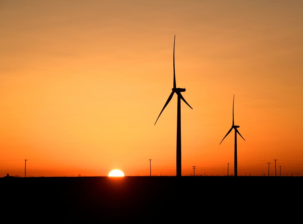 <p>Wind turbines operate at sunrise in the Permian Basin oil and natural gas production area in Big Spring, Texas, 12 February, 2019. REUTERS/Nick Oxford</p>