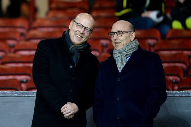 Joel Glazer (right) admits Manchester United's owners need to engage more with fans