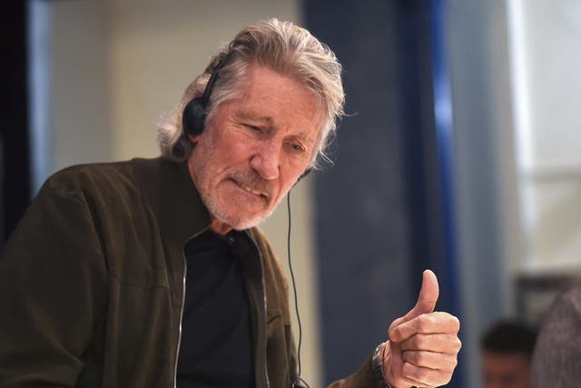 <p>British rock icon and activist Roger Waters gives his thumb up during a conference on Palestinian situation and Human Rights at the Uruguayan unions' organisation (PIT-CNT) headquarters in Montevideo, on 2 November, 2018</p>