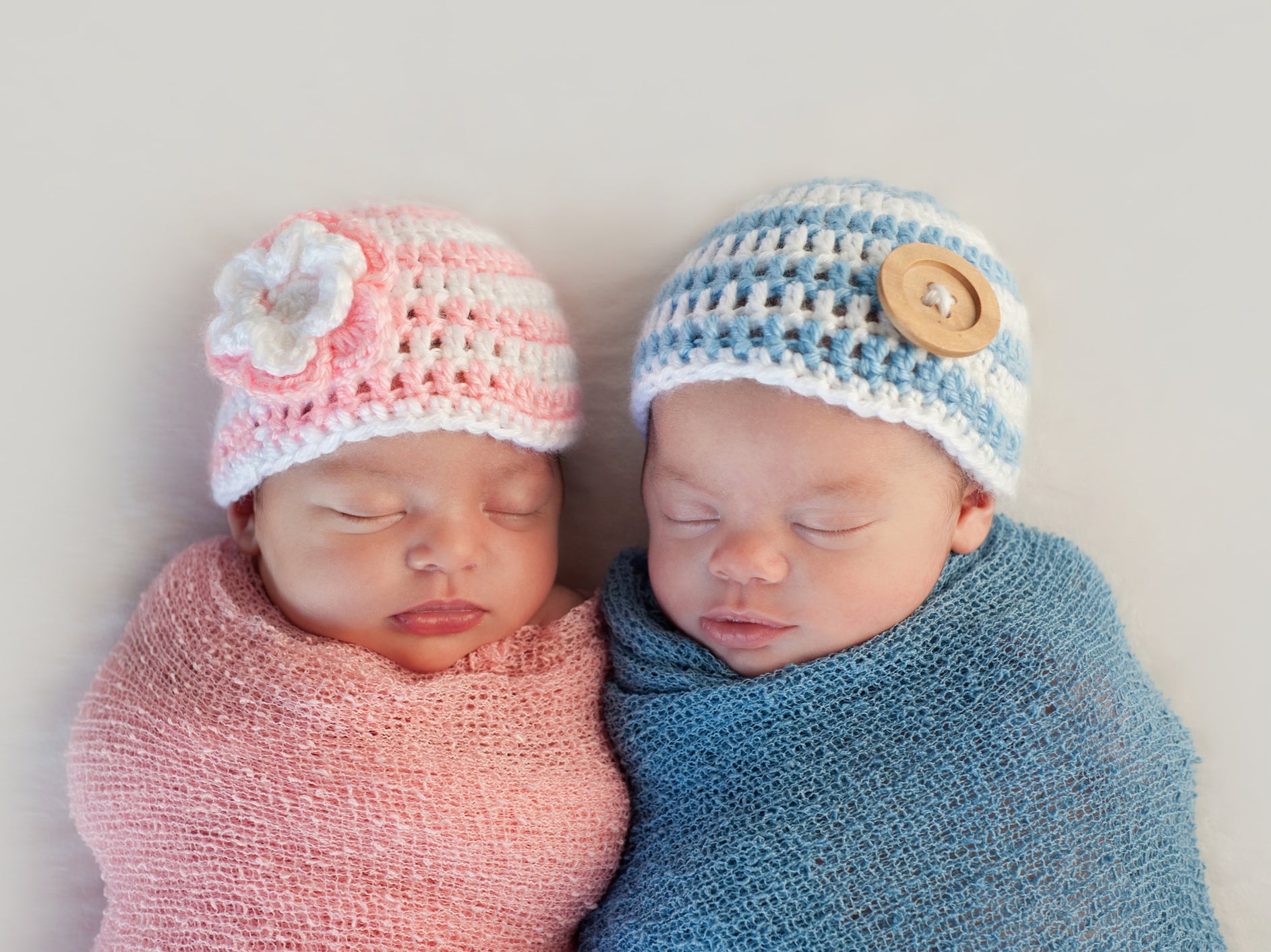 Boy and girl newborn babies