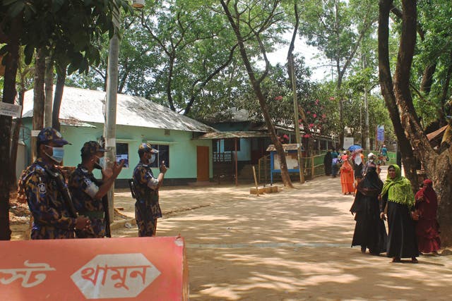<p>File image: Law enforcement personnel stand guard in the Kutupalong Rohingya refugee camp area where authorities imposed lockdown to contain the spread of the Covid-19 coronavirus in Ukhia (Bangladesh) on 21 May, 2021</p>