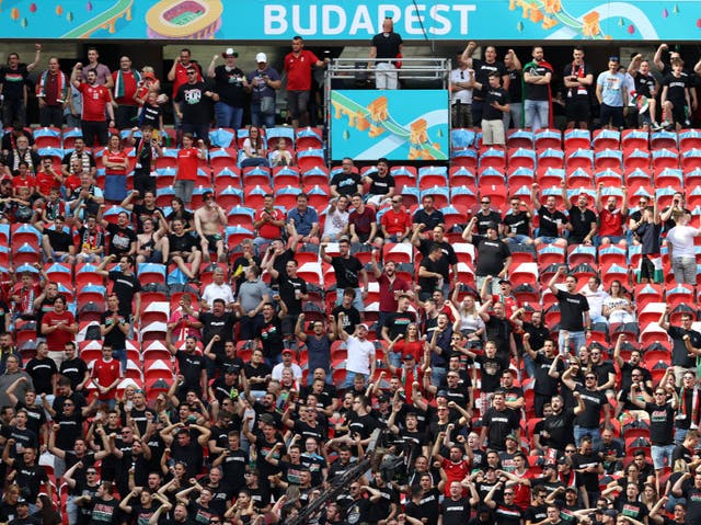 <p> Hungary fans show their support prior to kick-off at Puskas Arena</p>