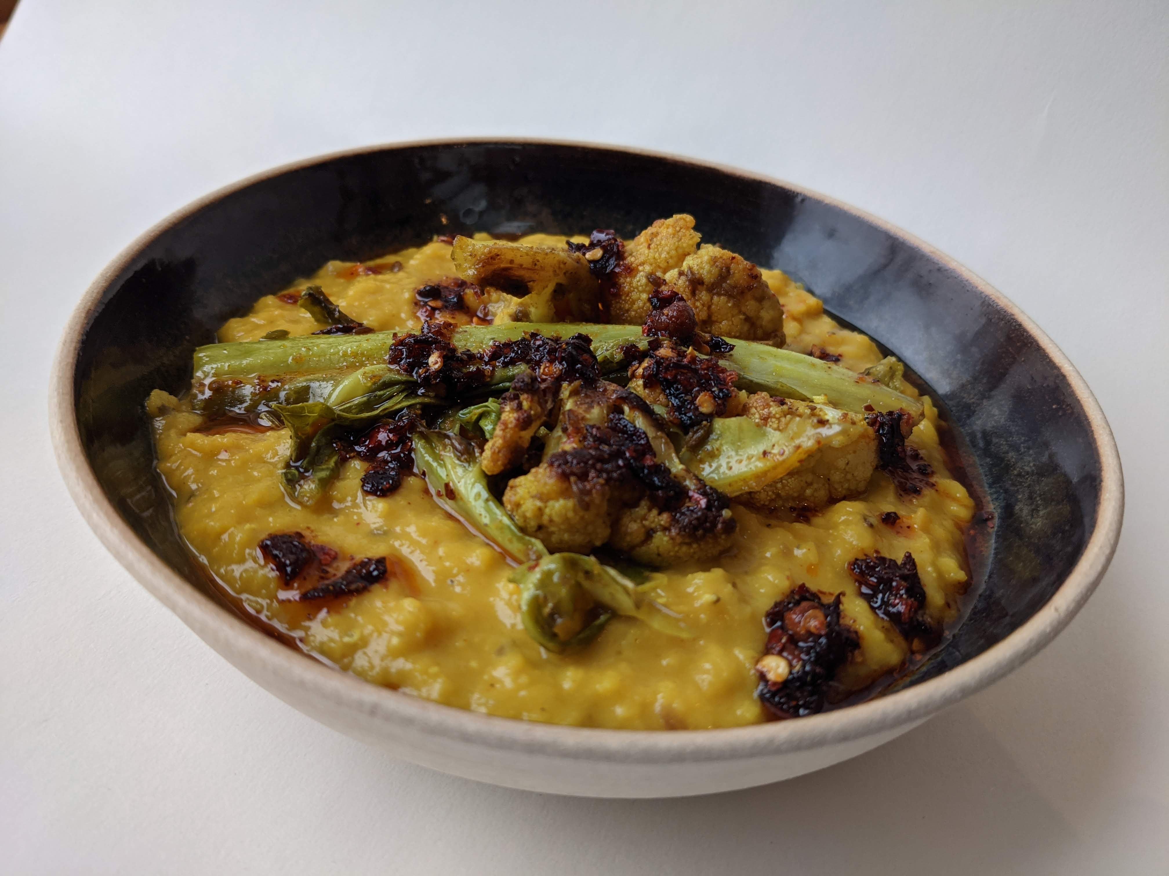 Ping Coombe’s coconut dhal with roasted cauliflower and chilli oil