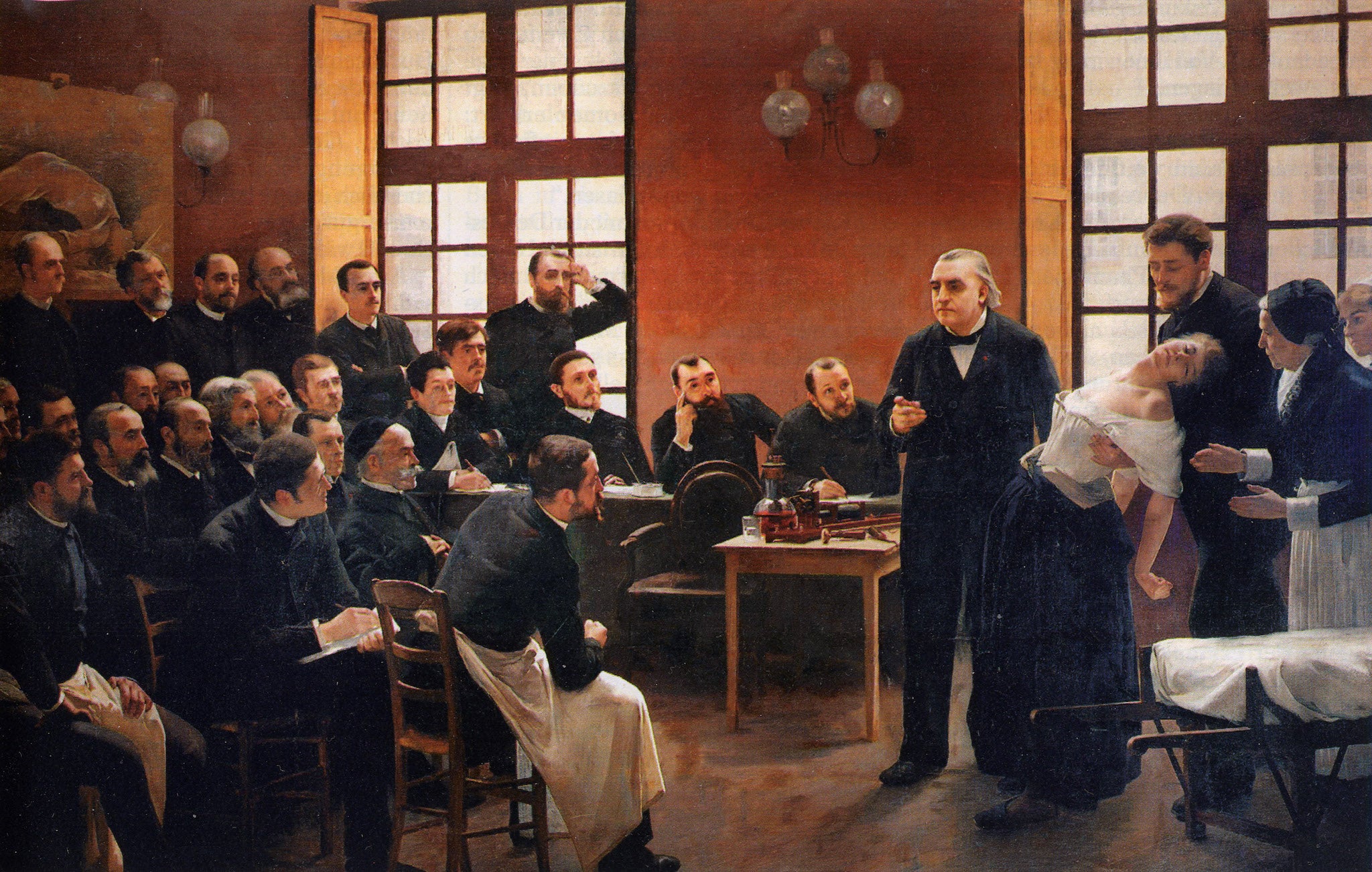 Jean-Martin Charcot presents a half-dressed woman to demonstrate hysteria to a group of men in ‘A Clinical Lesson at the Salpêtrière’ by André Brouillet (1887)