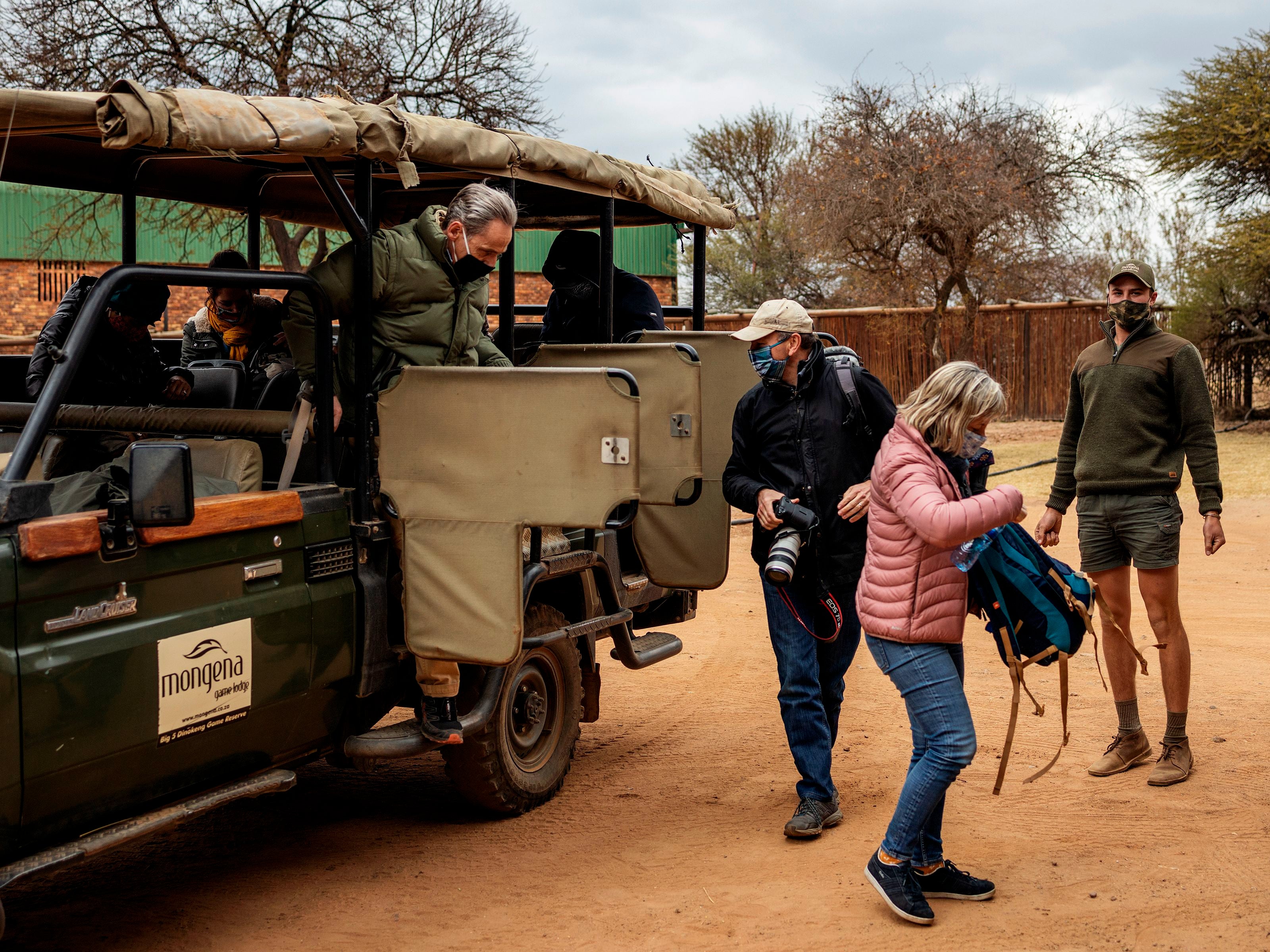 Tourists wearing face masks during a guided safari tour near Pretoria, South Africa