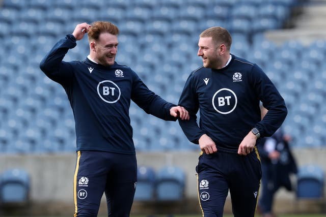 <p>Stuart Hogg (left) and Finn Russell (right) are set to miss the Murrayfield fixture</p>