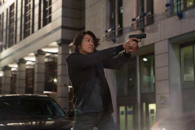 <p>He’s back: Sung Kang’s Han is the cool, stoic heart of the series</p>