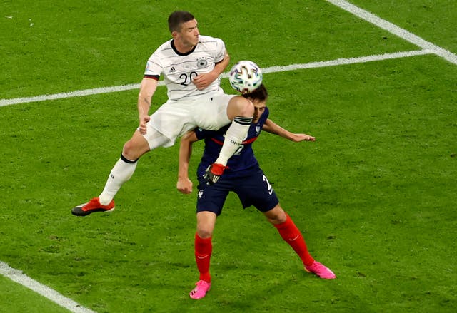 <p>France full-back Benjamin Pavard says he was knocked out following this clash with Germany's Robin Gosens</p>