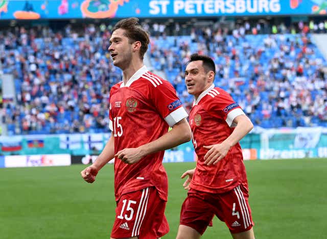 Russia’s Aleksei Miranchuk, front, celebrates after scoring the winner against Finland