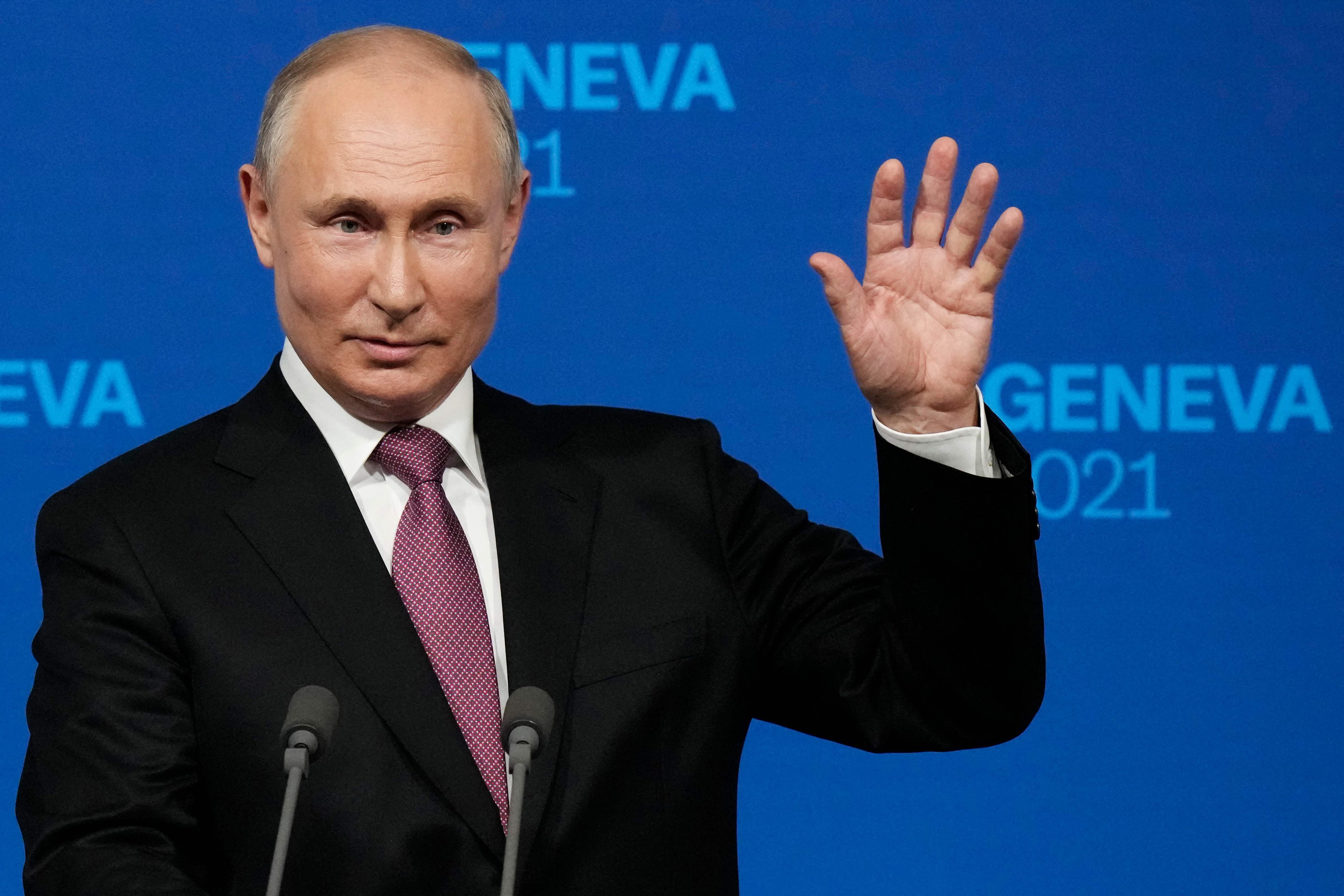 Russia's President Vladimir Putin holds a press conference after meeting with US President in Geneva