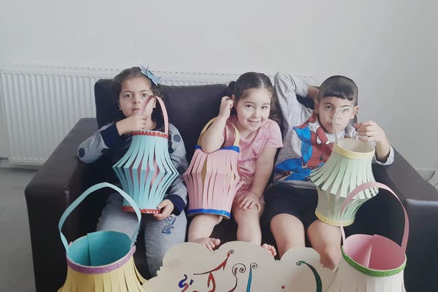 <p>The children of Syrian refugee Waed Almbasbes, aged nine, seven and three, are enjoying their new life in the UK after spending years in a refugee camp</p>