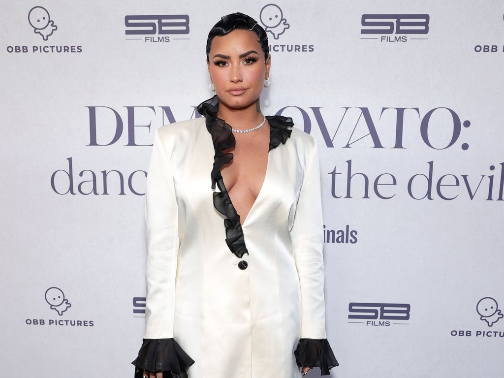 Demi Lovato says they were ‘shedding all of the gender norms’ placed on them when they cut their hair short