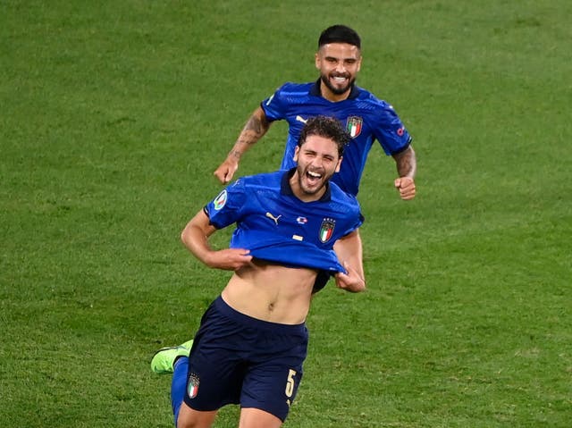 <p>Manuel Locatelli celebrates scoring for Italy</p>