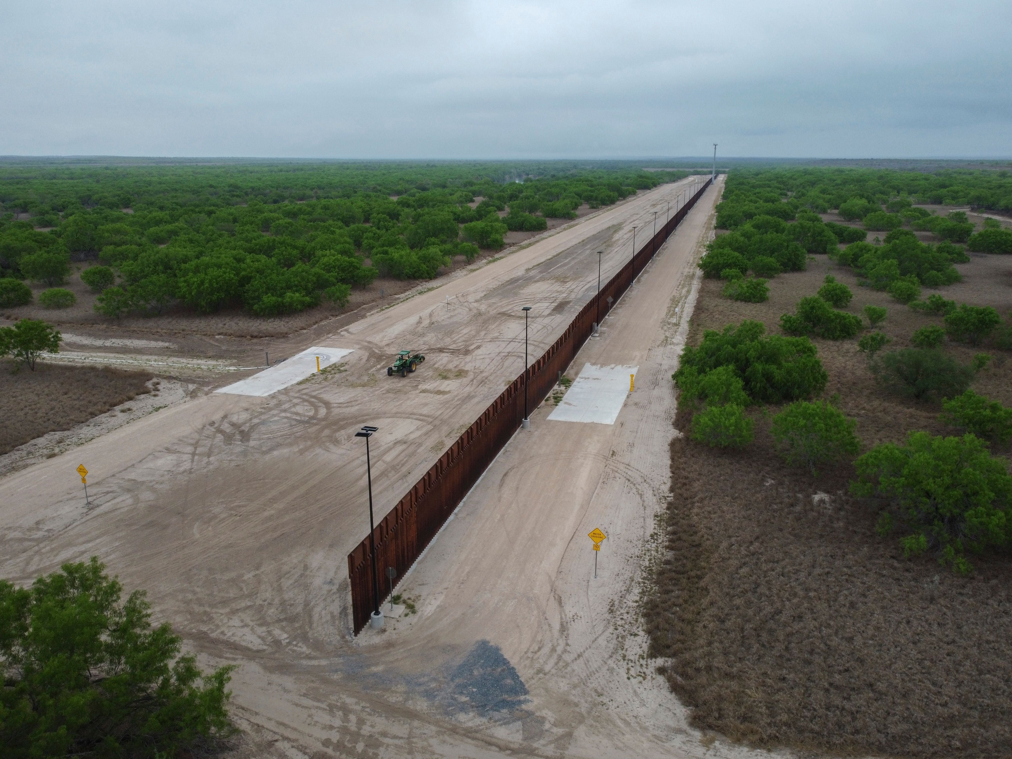 <p>File: An unfinished section of a border wall that former US president Donald Trump tried to build </p>