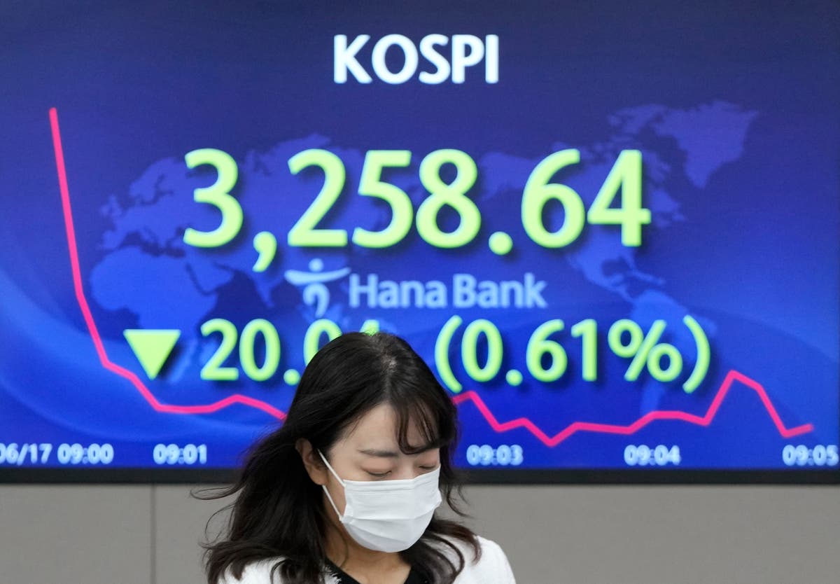 Asian stocks mixed after Wall St falls on Fed rate hike hint