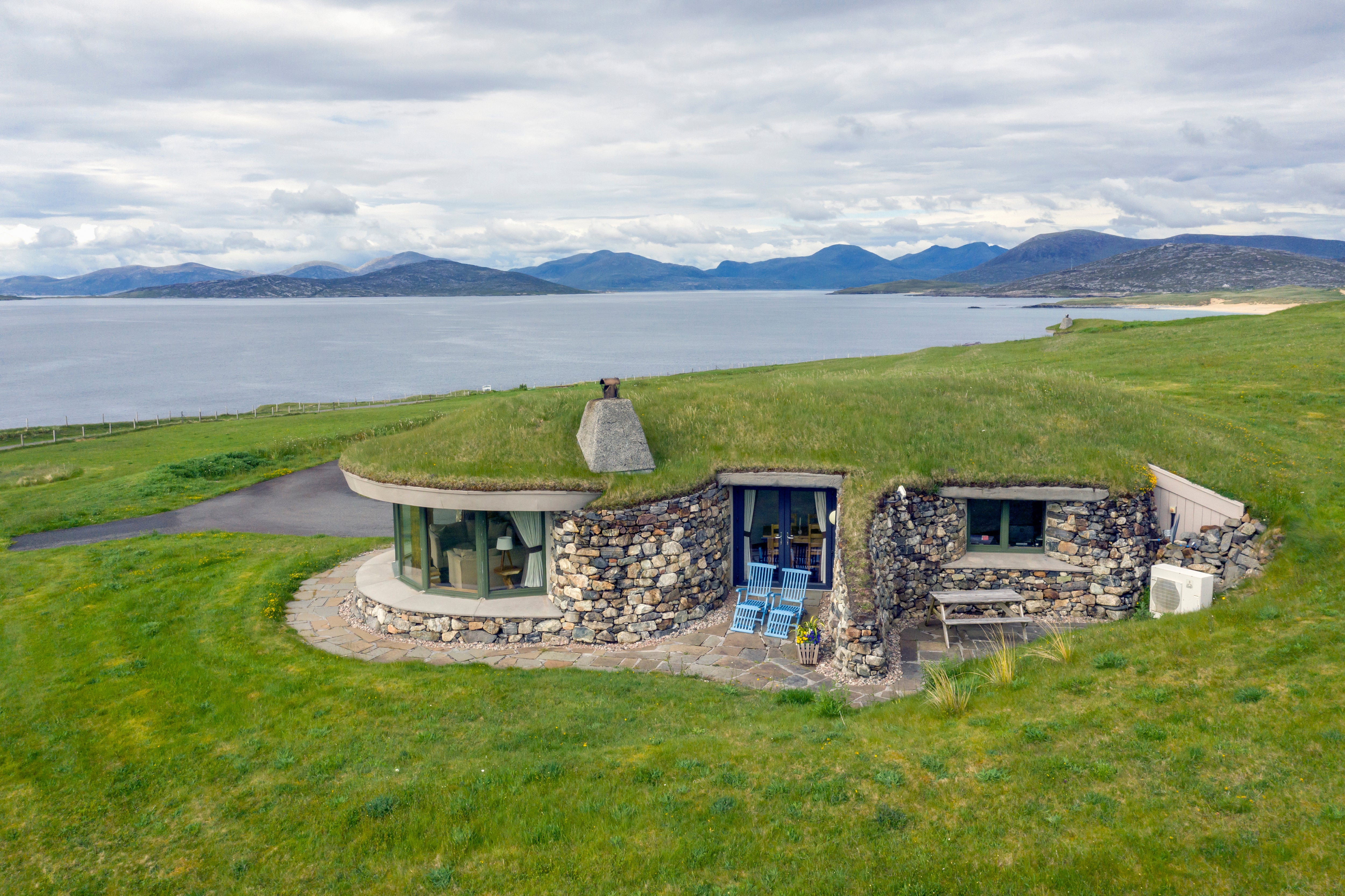 Turf houses blend into their landscape