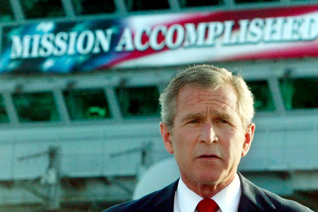 <p>George W Bush declares combat in Iraq over aboard aircraft carrier USS Abraham Lincoln in 2003</p>