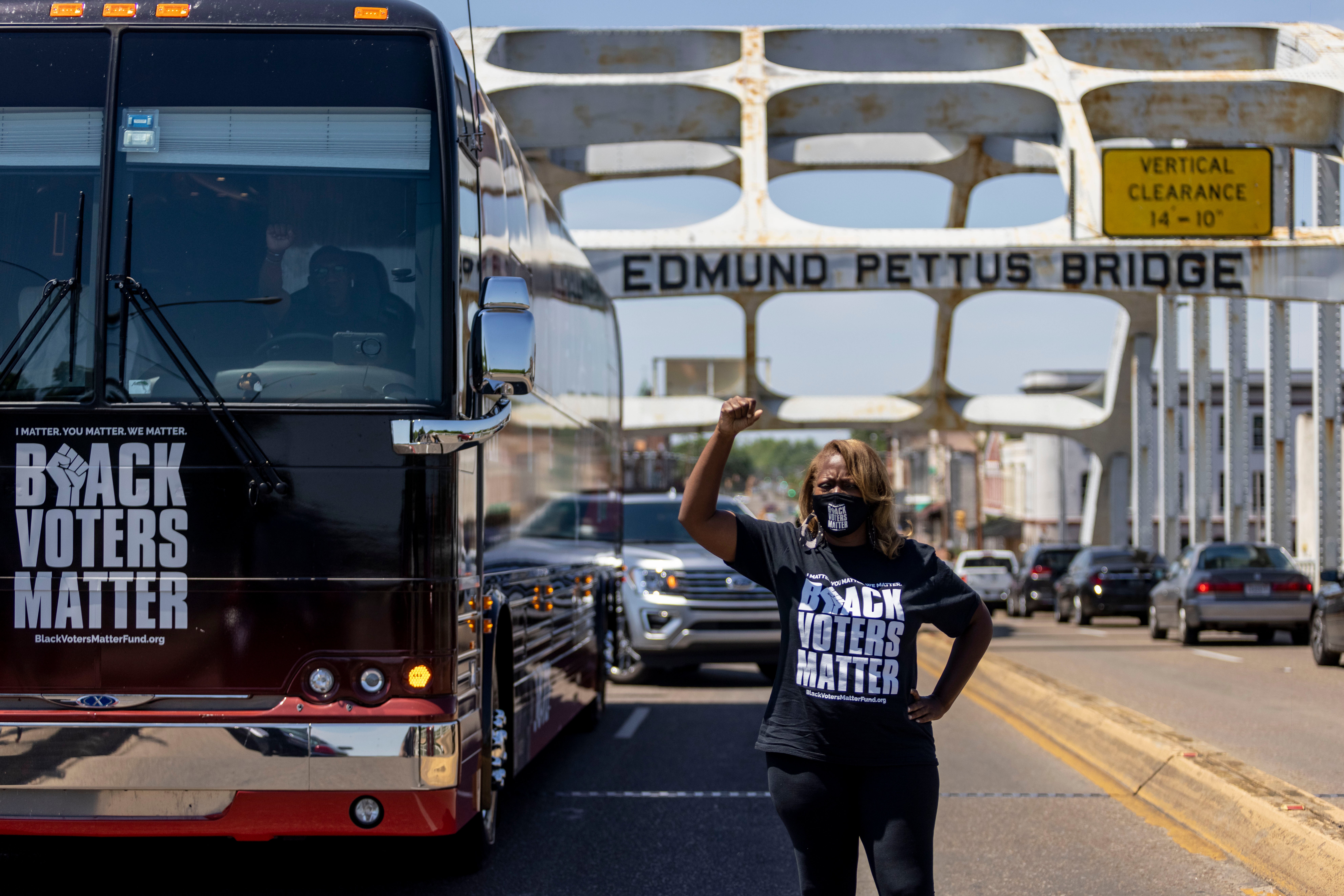 Black Voters Matter co-founder LaTosha Brown stands on the Edmund Pettus Bridge in Selma, Alabama, nearly 60 years after critical voting rights marches.