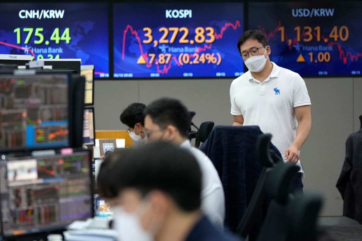 Asian shares mostly rise as markets digest Fed moves