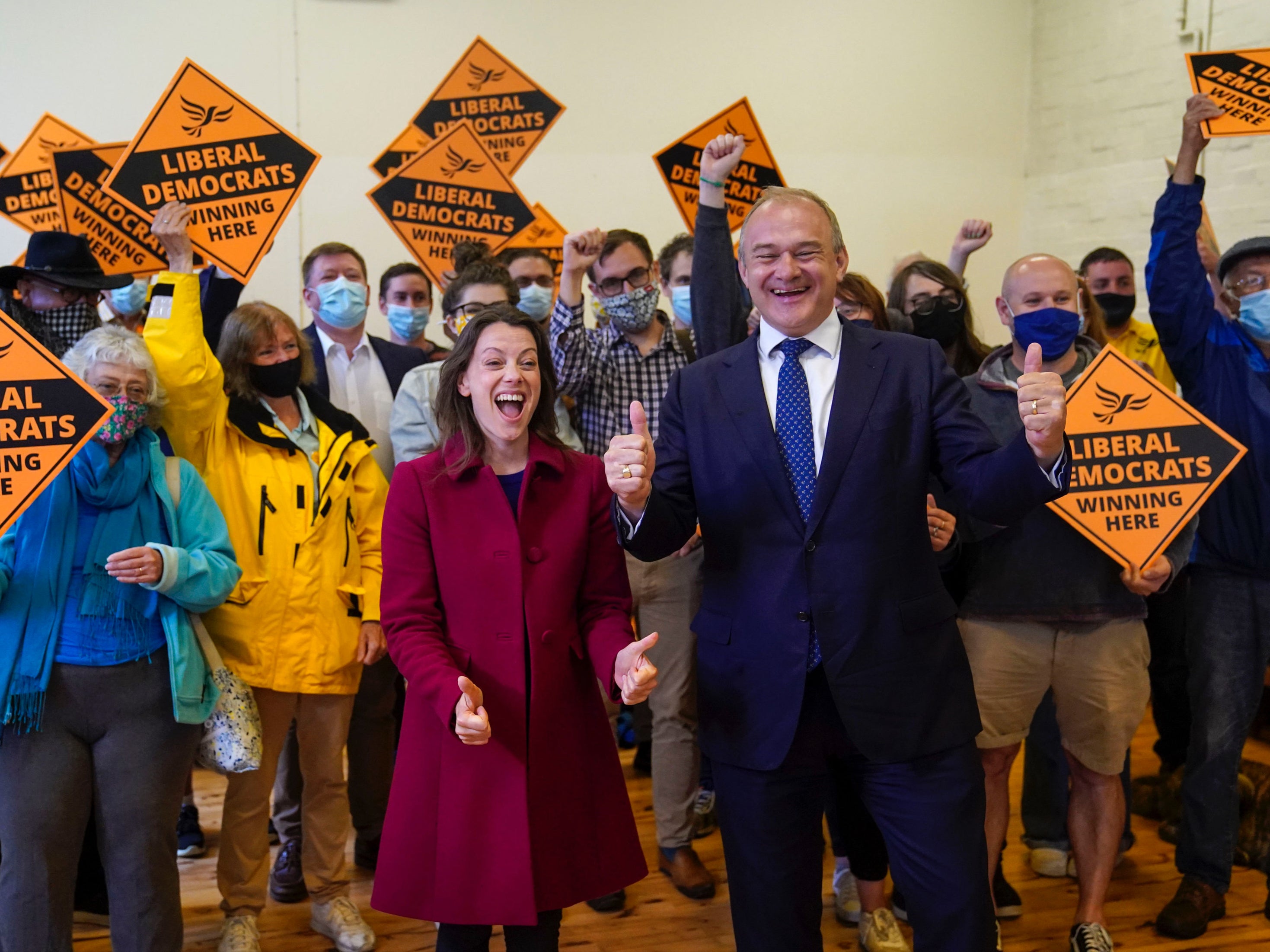 Liberal Democrat leader Ed Davey and Sarah Green, the party’s new MP for Chesham and Amersham, celebrate her by-election victory on Friday