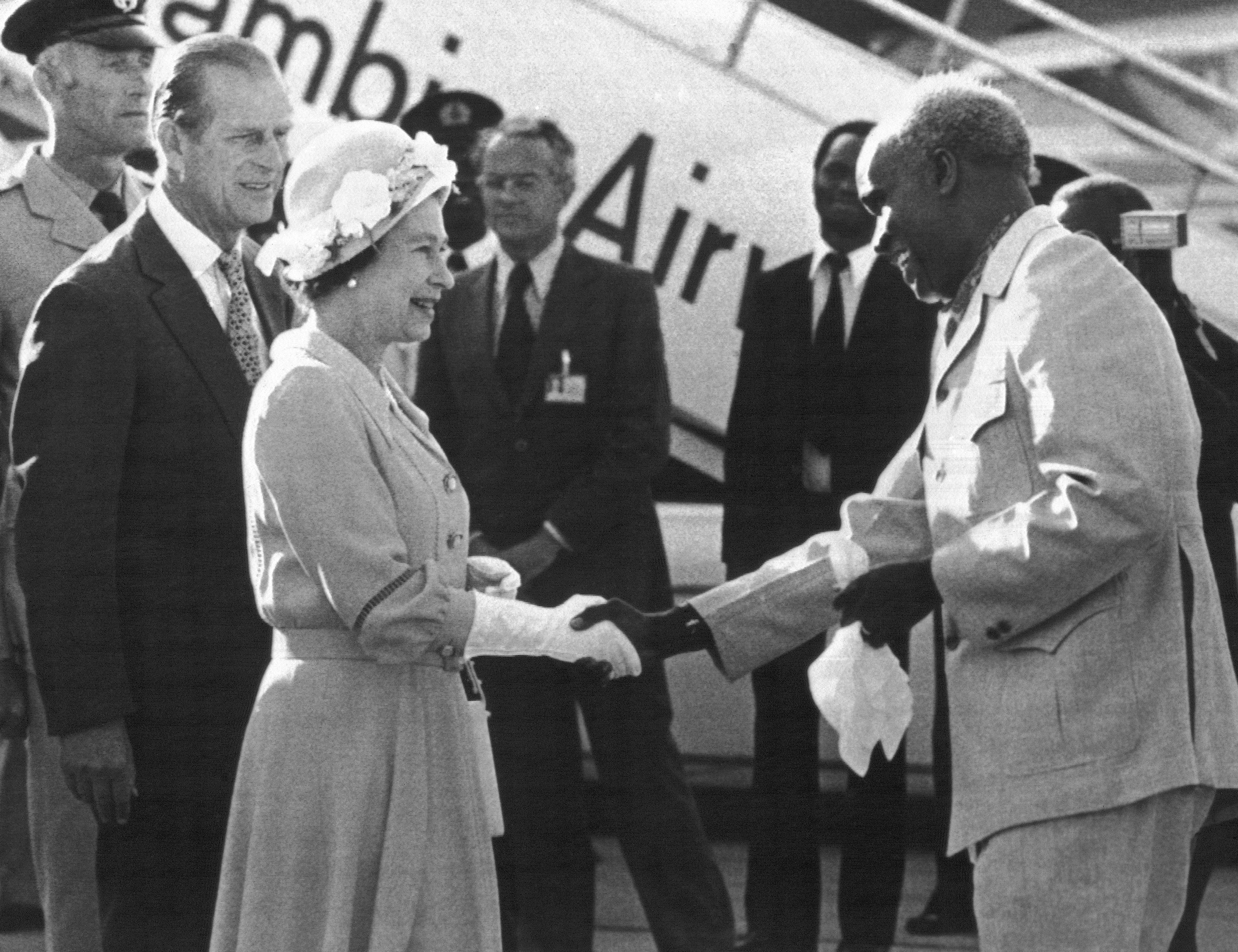 President Kenneth Kaunda greets the Queen upon her arrival in Lusaka in July 1979