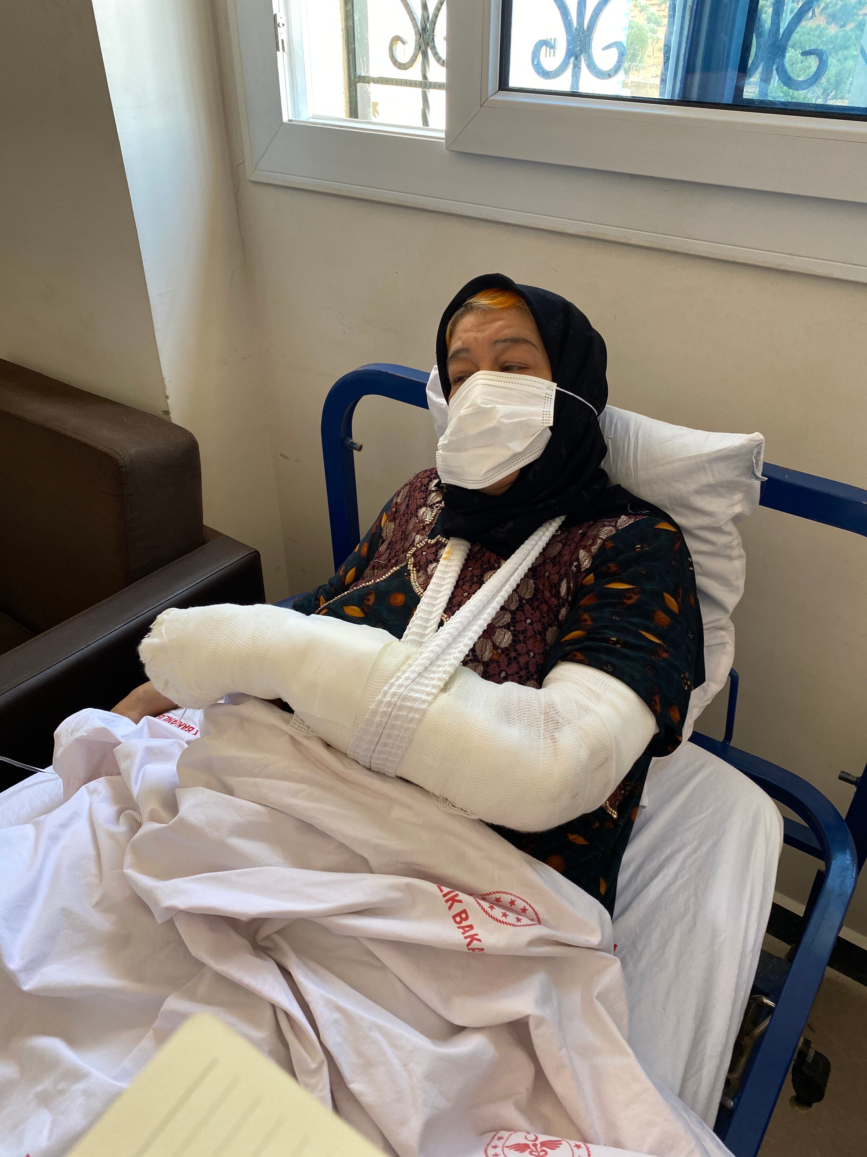 <p>Daid al Kamal, 60,  went to the hospital to recover from shock after her neighbourhood was struck by a barrage of rockets in Afrin, northwest Syria. Then rockets hit the hospital. She recovers at another hospital</p>