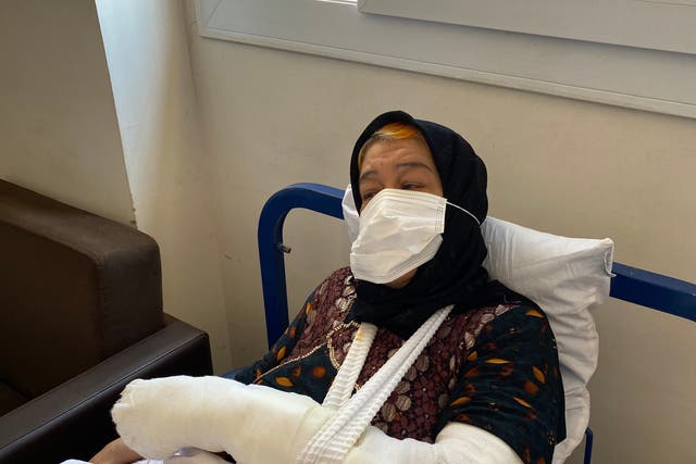 <p>Daid al Kamal, 60,  went to the hospital to recover from shock after her neighbourhood was struck by a barrage of rockets in Afrin, northwest Syria. Then rockets hit the hospital. She recovers at another hospital</p>