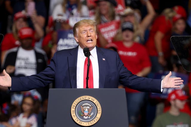 <p>Then-US President Donald Trump arrives at  a campaign rally at the BOK Center, 20 June, 2020 in Tulsa, Oklahoma. </p>