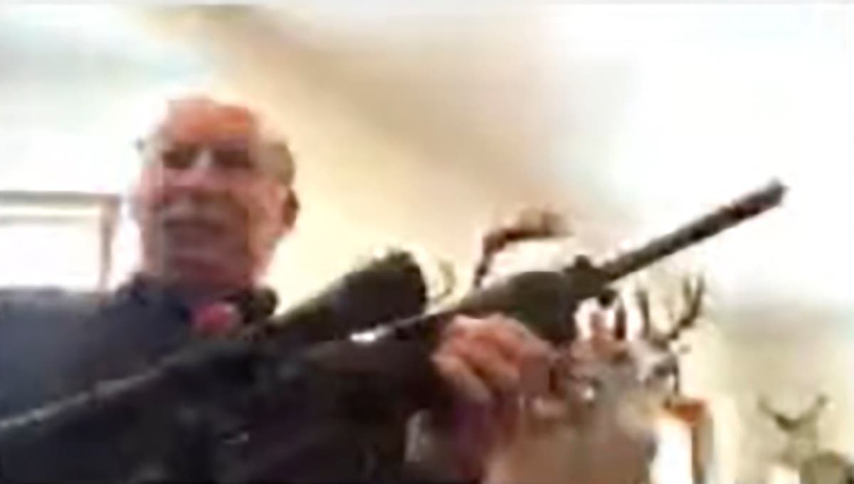 No charges filed against Michigan official who flashed rifle