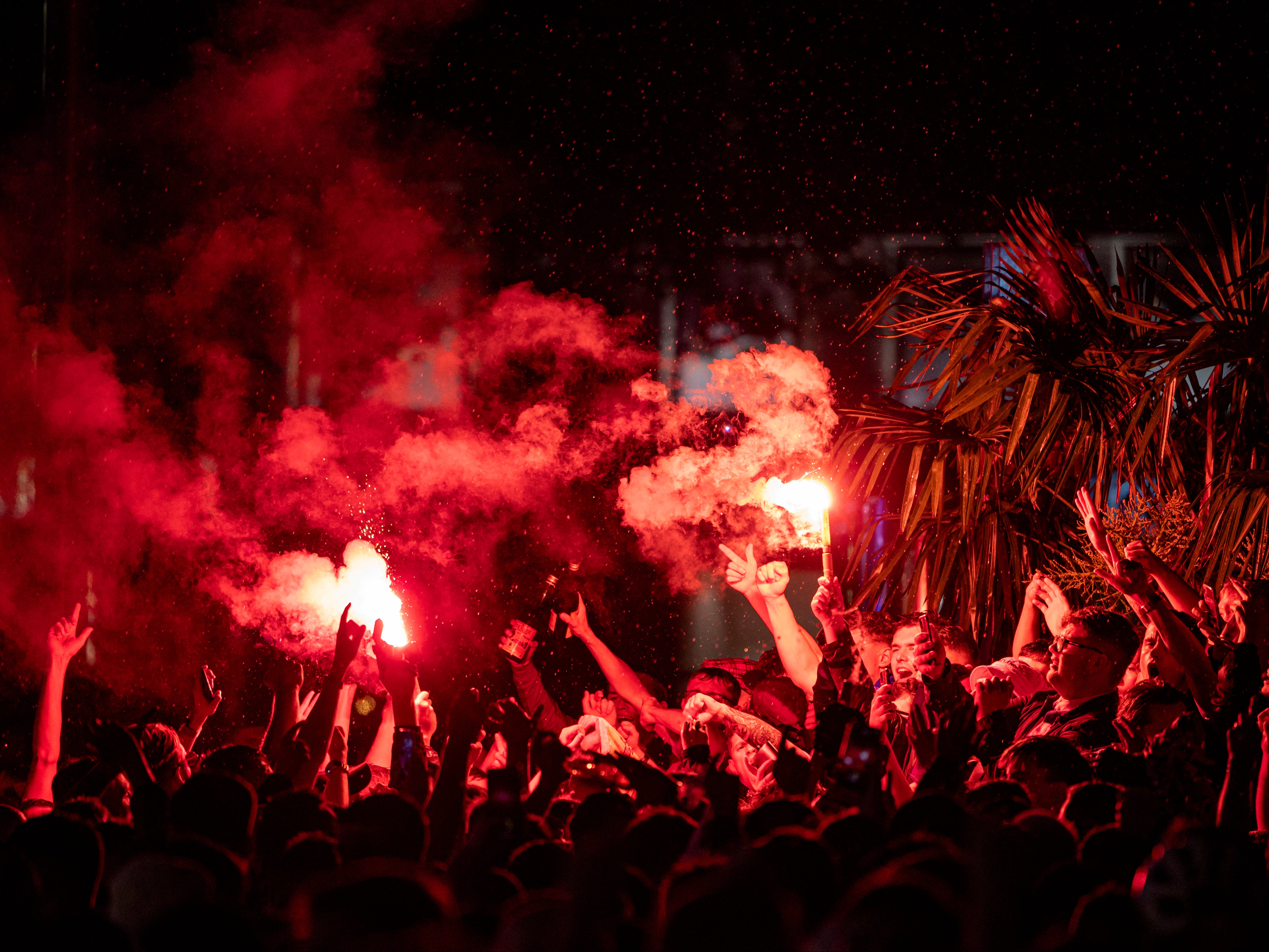 Scotland fans let off flares in Leicester Square after the England v Scotland game ended 0-0