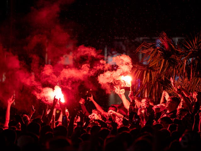 <p>Scotland fans let off flares in Leicester Square after the England v Scotland game ended 0-0</p>