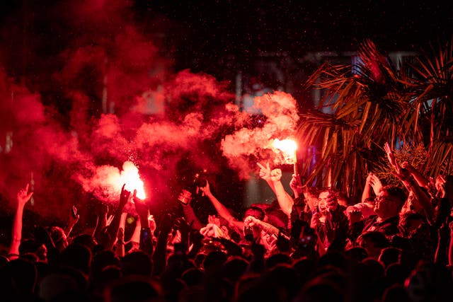 <p>Scotland fans let off flares in Leicester Square after the England v Scotland game ended 0-0</p>