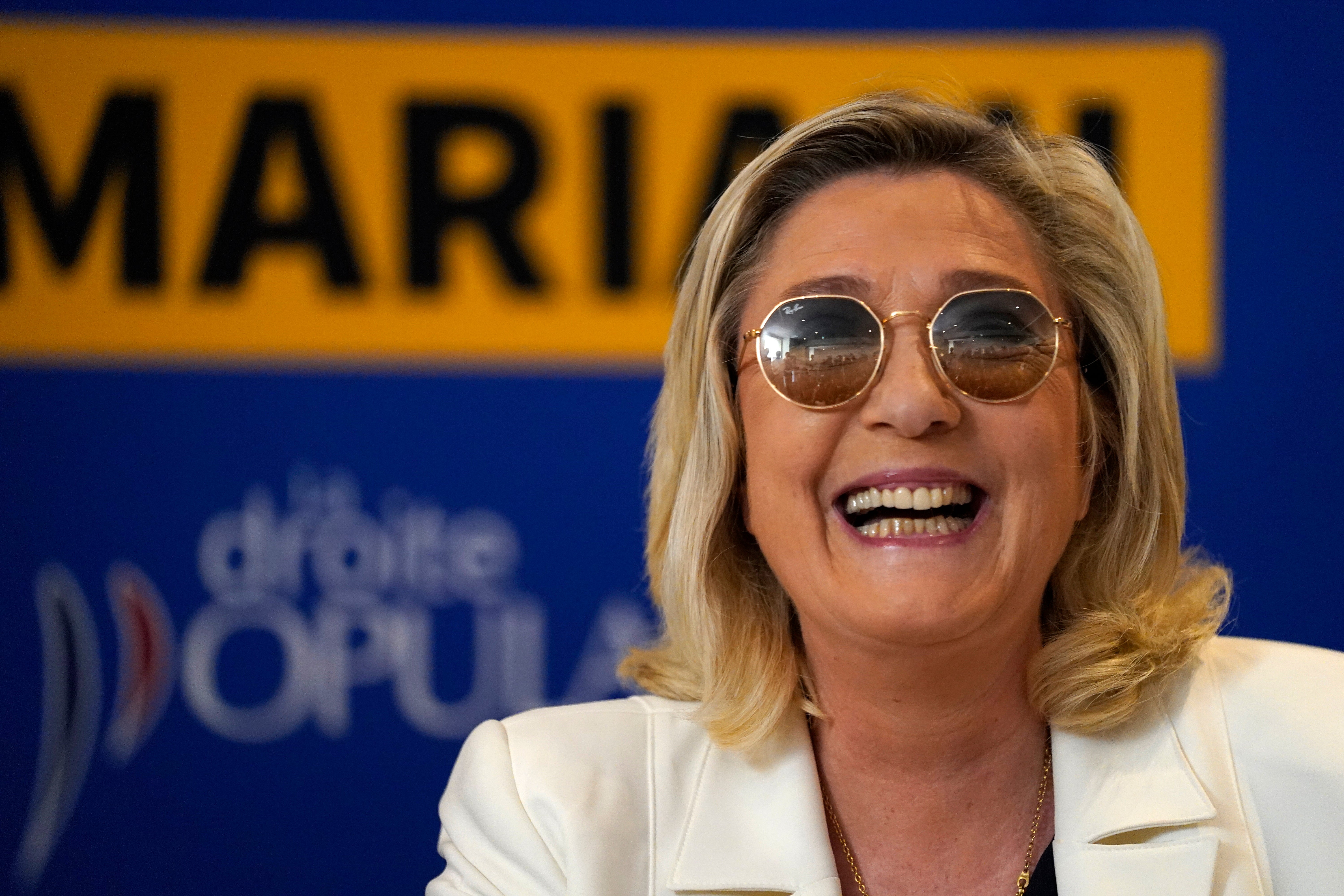 Far-right leader Marine le Pen smiles during a press conference in Toulon, southern France