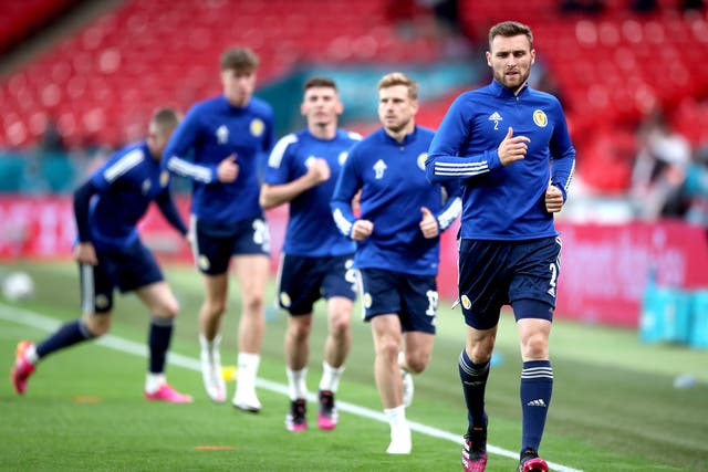 Scotland’s Stephen O’Donnell, right, warms up at Wembley
