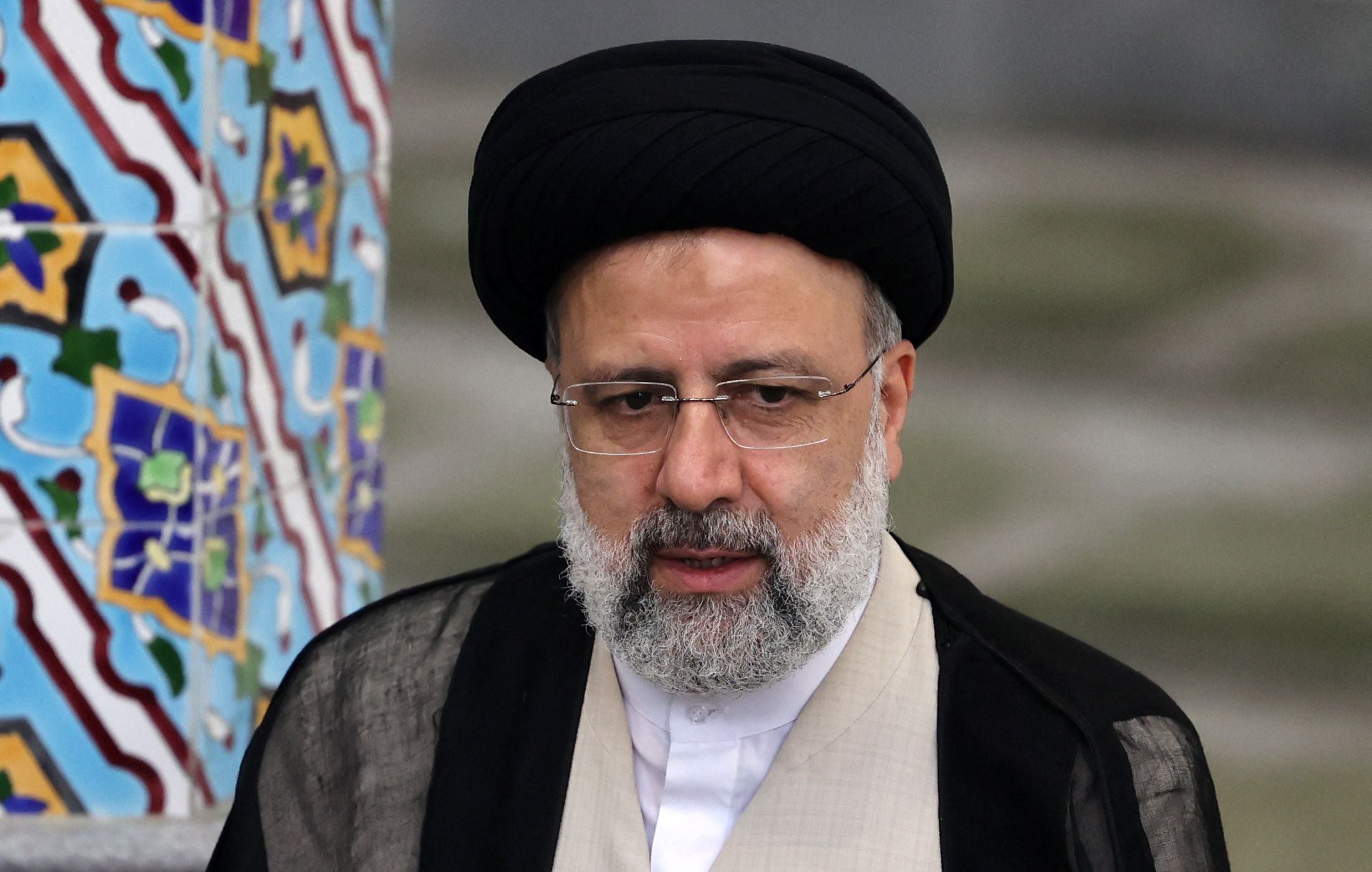 Ebrahim Raisi at a polling station in the capital Tehran after casting his vote