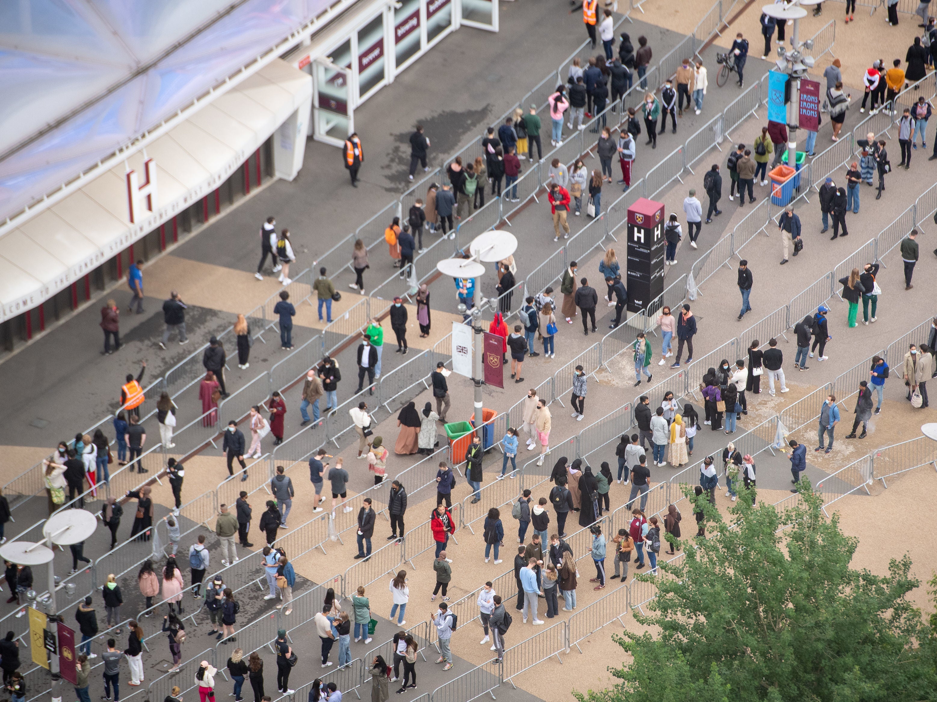Long queues formed outside an NHS vaccination clinic at West Ham’s London Stadium in Stratford, east London